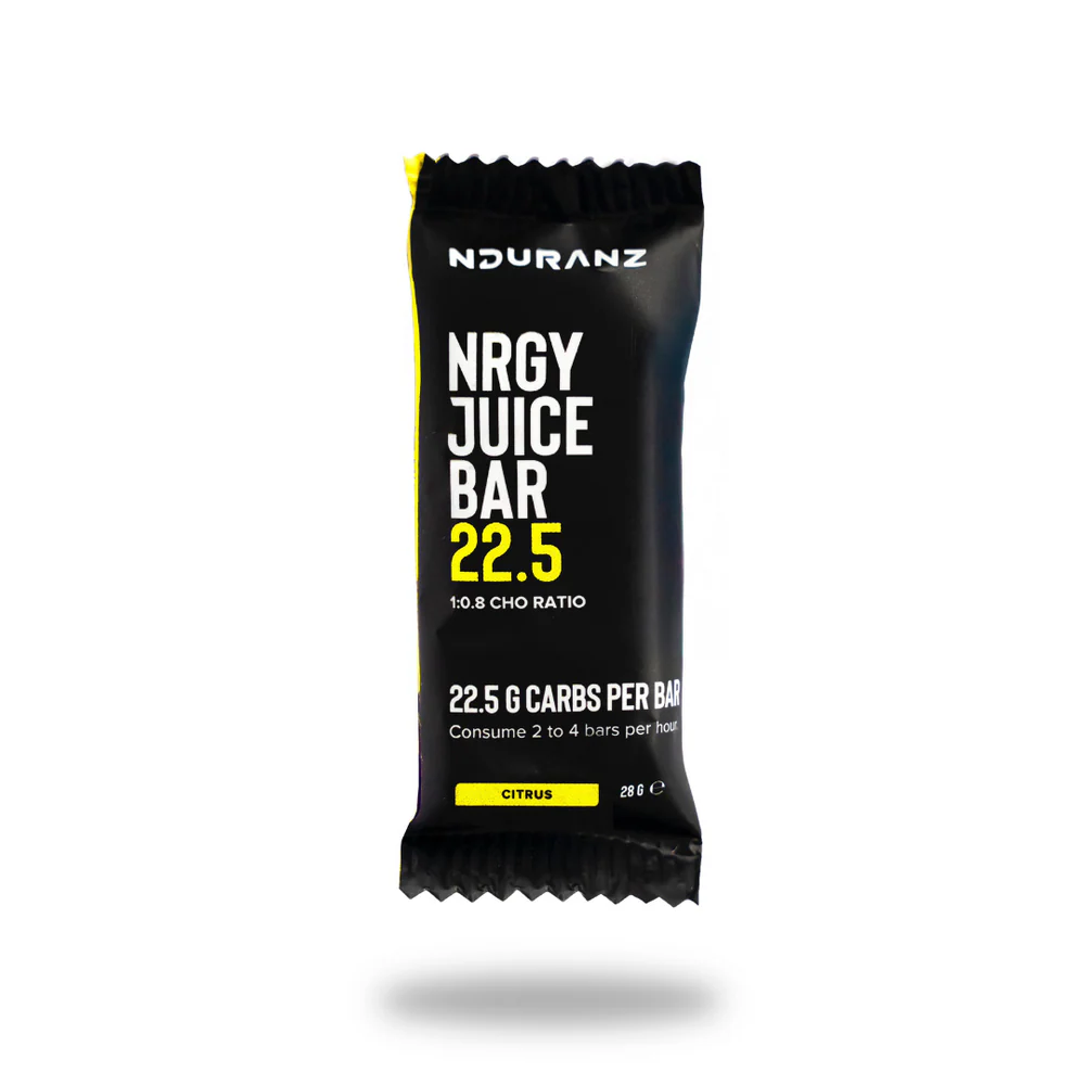 Nduranz Energy Juice Bar 22.5 with vibrant fruit and nut toppings, showcasing a nutritious snack with colorful ingredients.